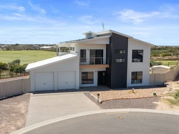 Real estate professionals discussing buyer strategy