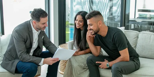 Property buyer's agent reviewing property listings